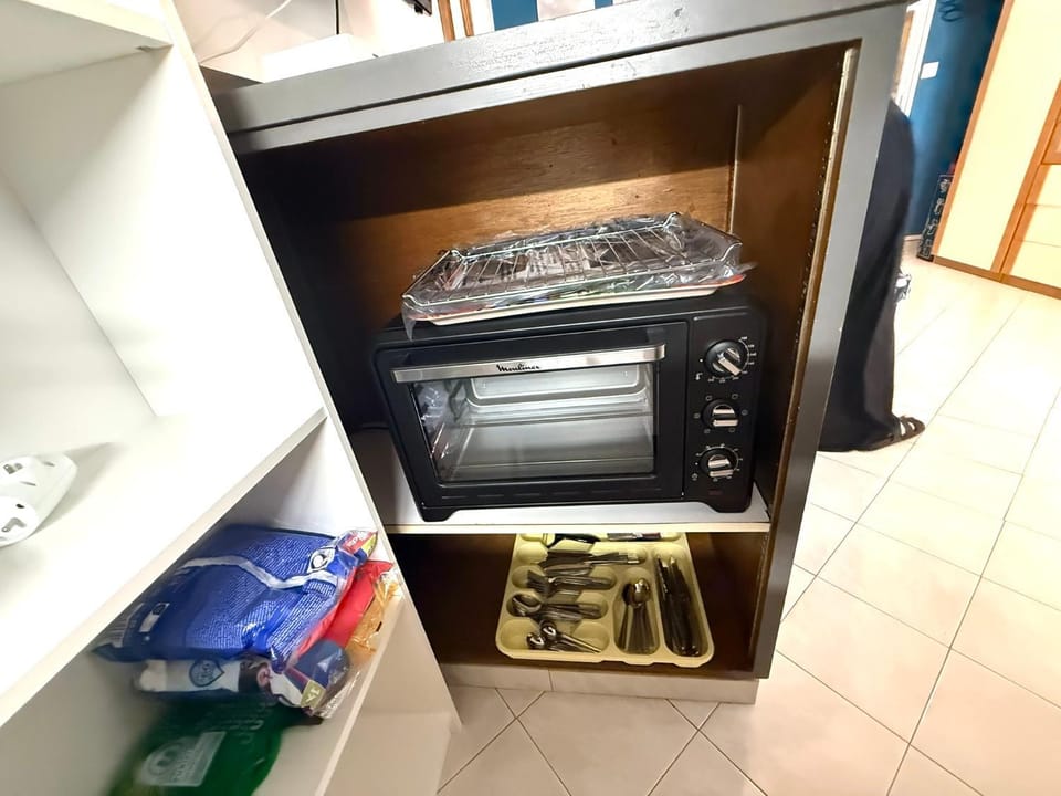 Kitchen or kitchenette, oven