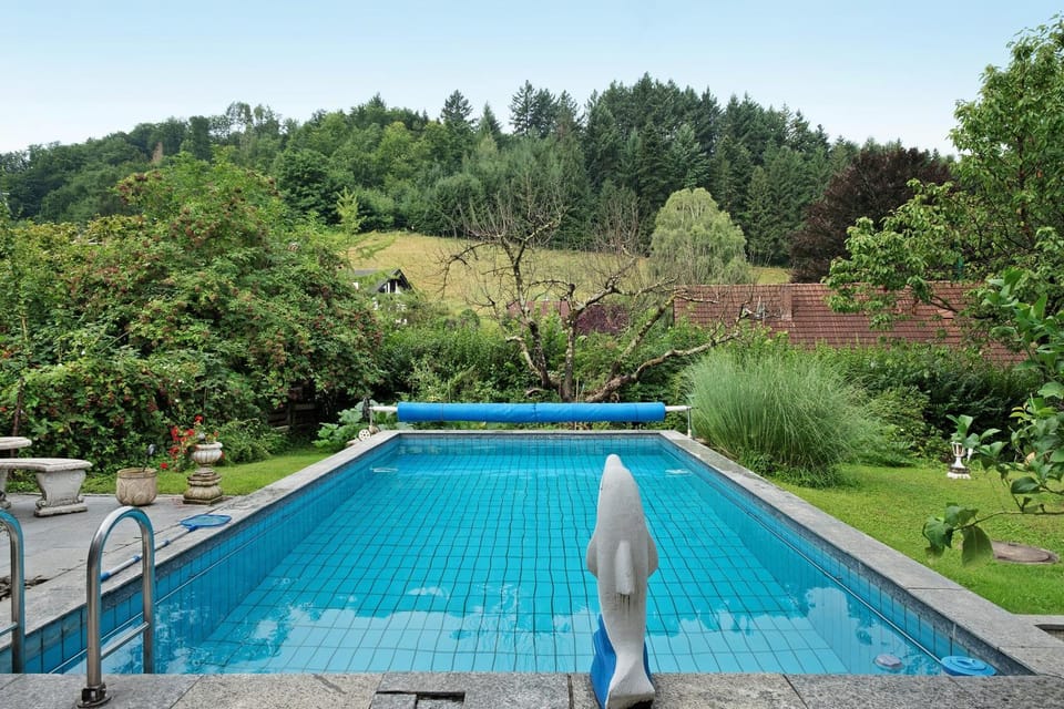 Property building, Living room, Swimming pool