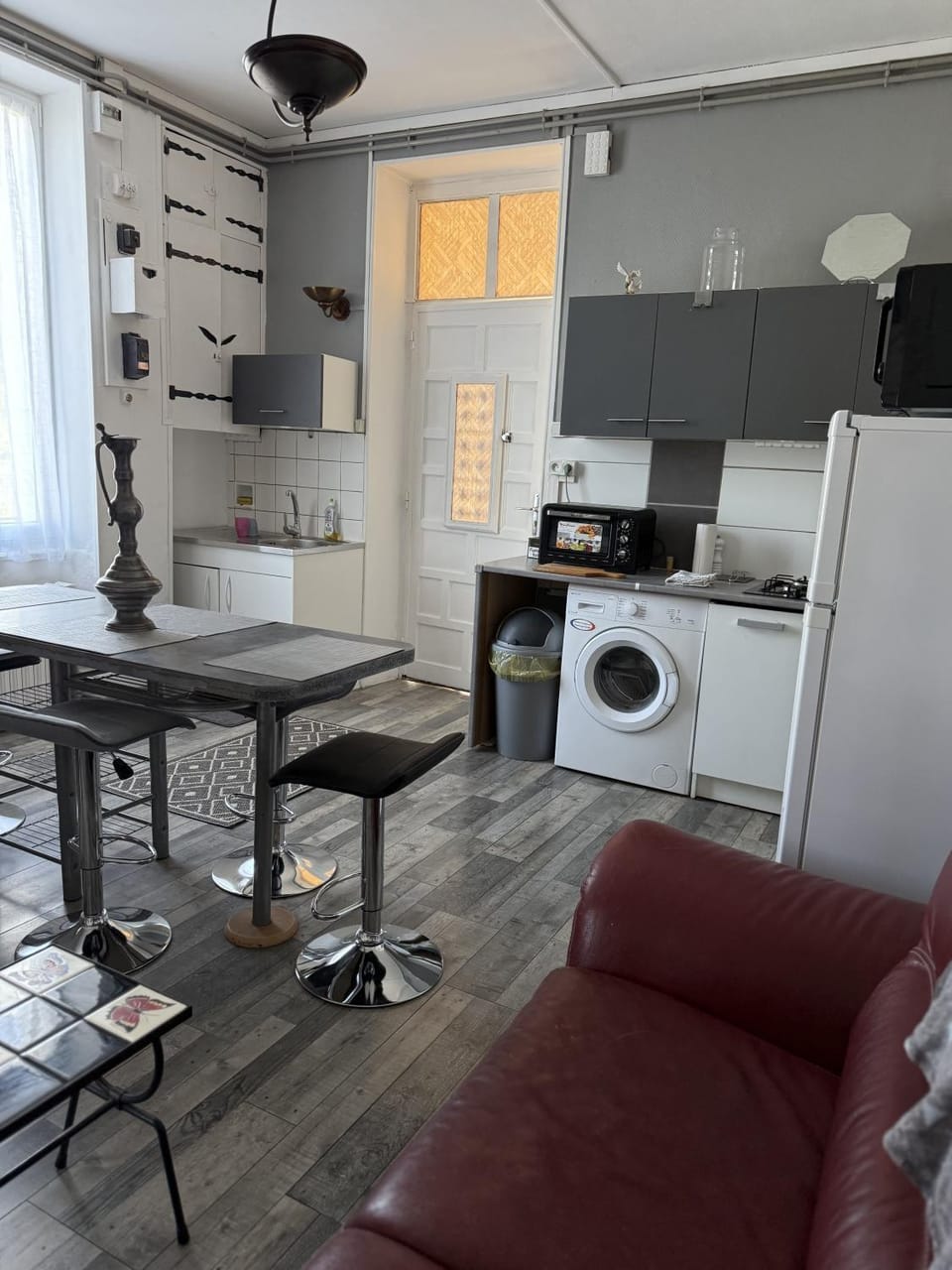 Living room, Seating area, Dining area, oven, stove, washing machine