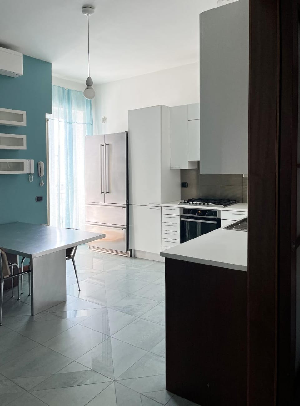 Kitchen or kitchenette, dishwasher, oven, stove