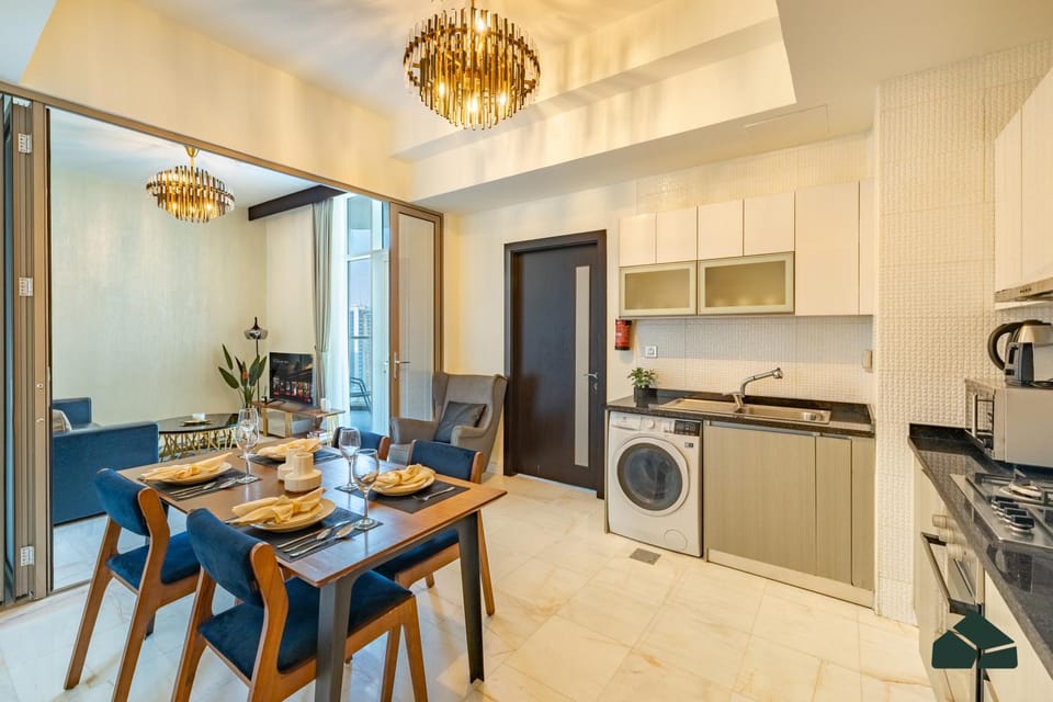 Kitchen or kitchenette, Living room, Seating area, Dining area, oven, stove, toaster, washing machine