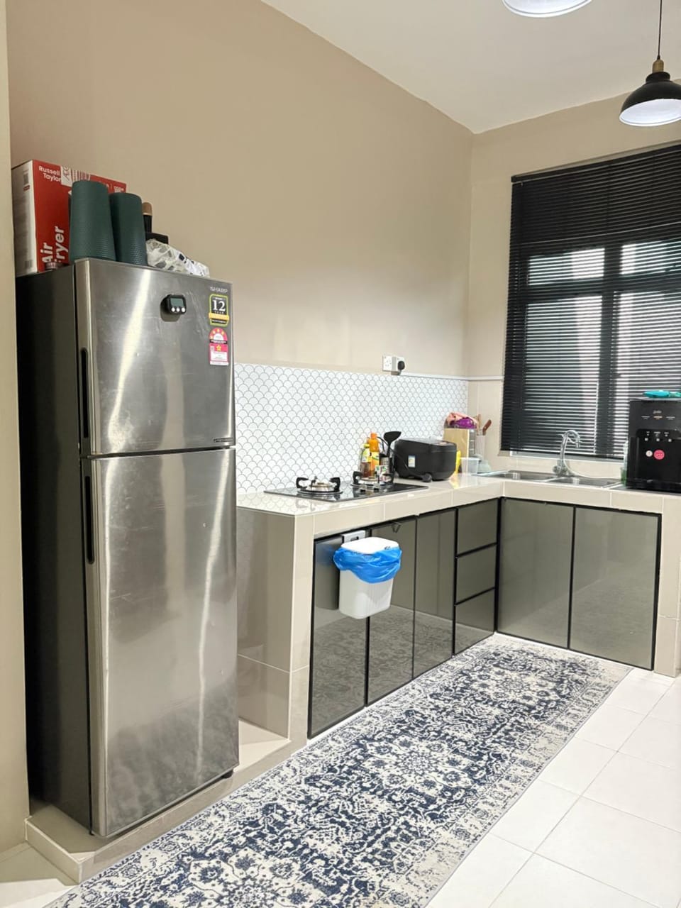 Kitchen or kitchenette, dishwasher, oven, stove