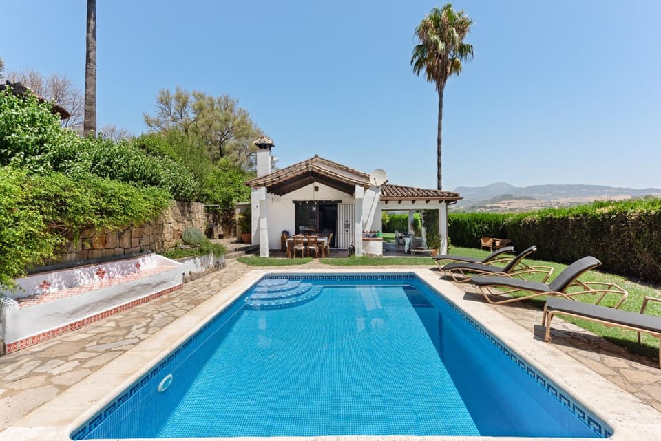Property building, Living room, Swimming pool