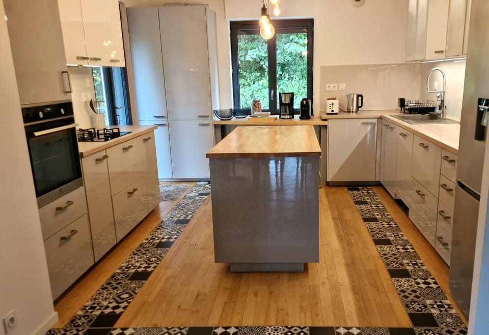 Kitchen or kitchenette, dishwasher, oven, stove, toaster