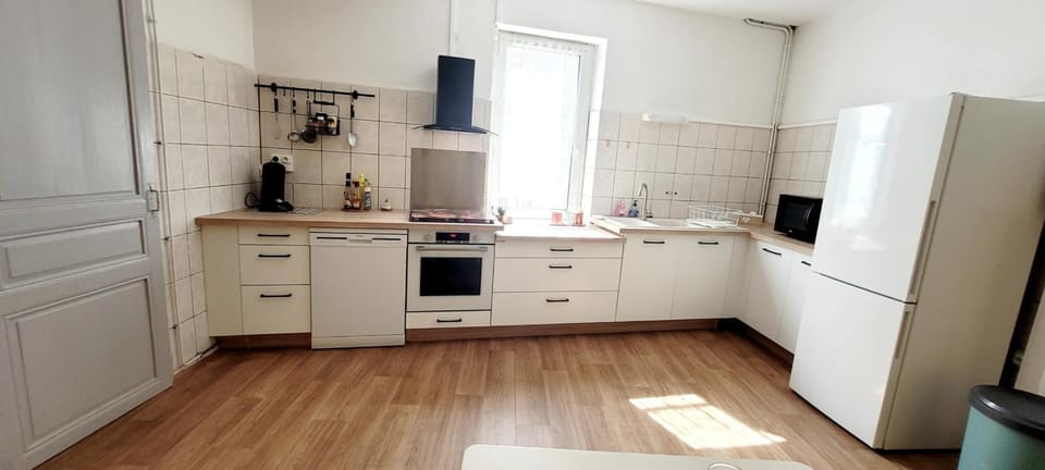 Kitchen or kitchenette, dishwasher, oven, stove
