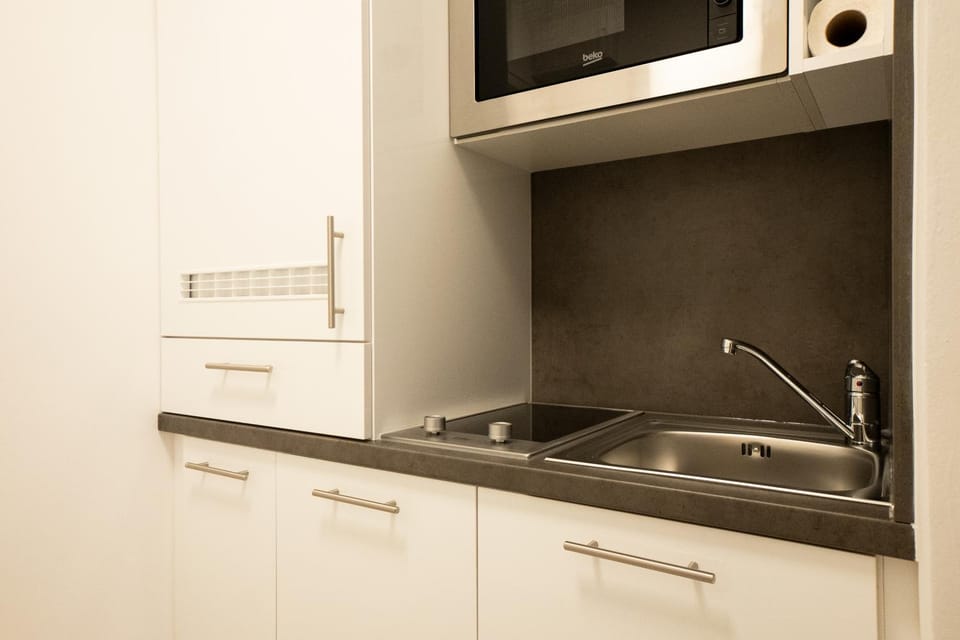Kitchen or kitchenette, microwave