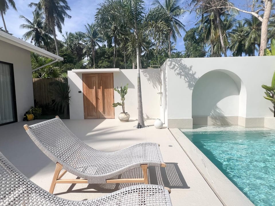 Property building, Day, Natural landscape, Pool view, Swimming pool, sunbed