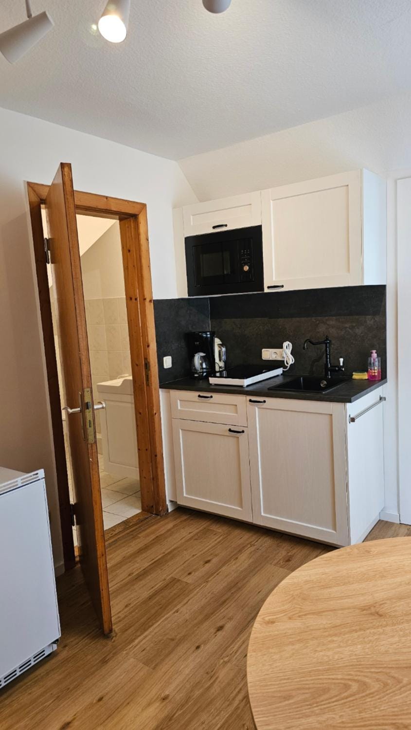 Kitchen or kitchenette, stove