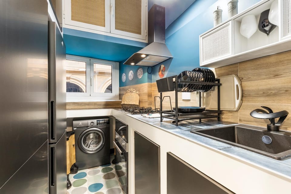 Kitchen or kitchenette, stove, washing machine
