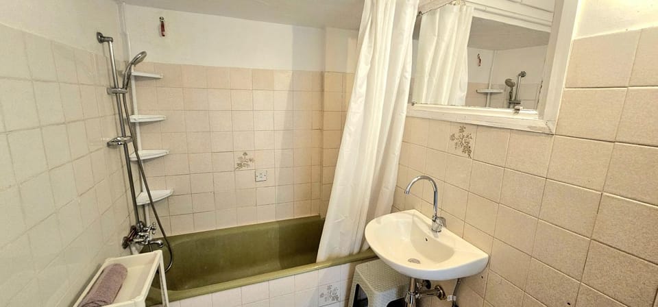 Retro art and mirrors Molos Apartment in Limassol City
