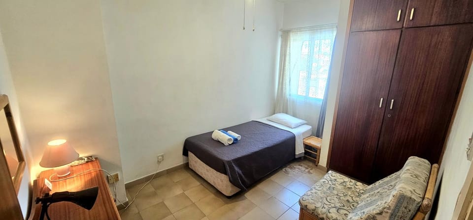 Retro art and mirrors Molos Apartment in Limassol City