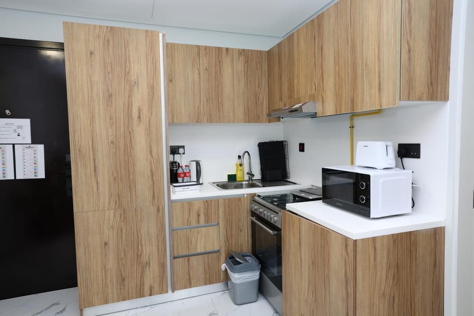 Coffee/tea facilities, Kitchen or kitchenette, microwave, oven, toaster, washing machine