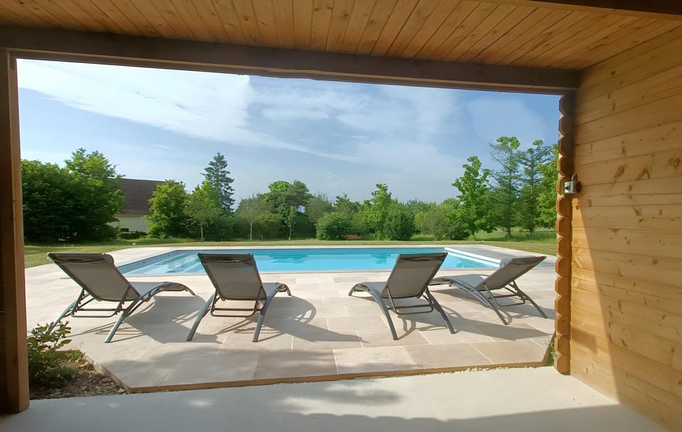 Property building, Living room, Swimming pool