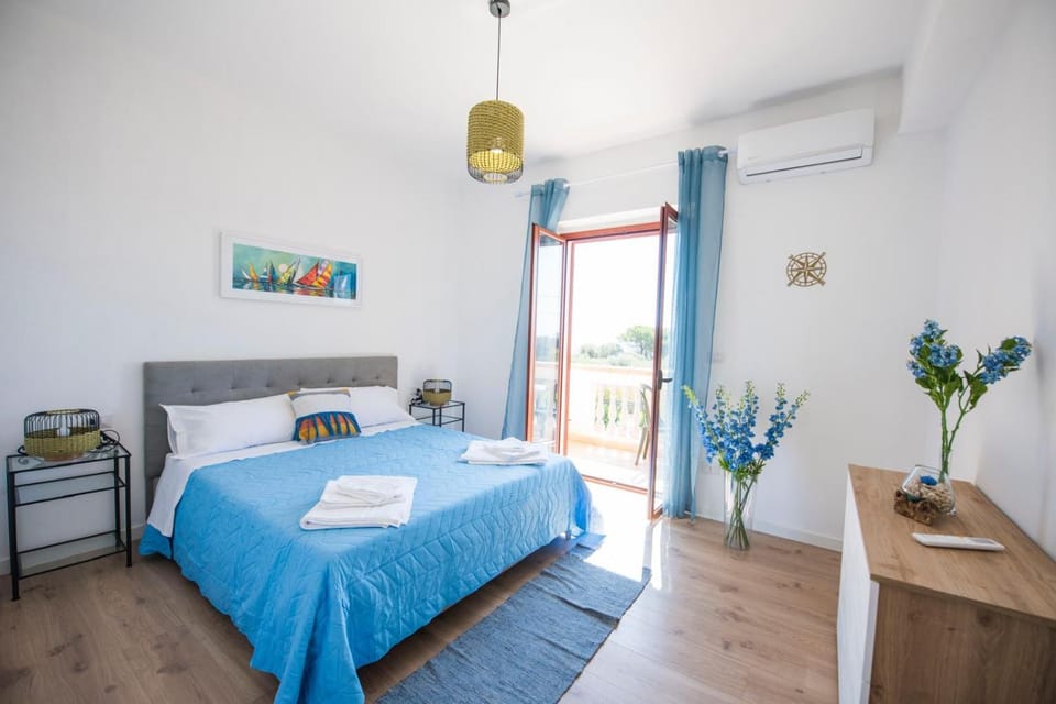 Bed, Photo of the whole room, Bedroom, towels, air conditioner