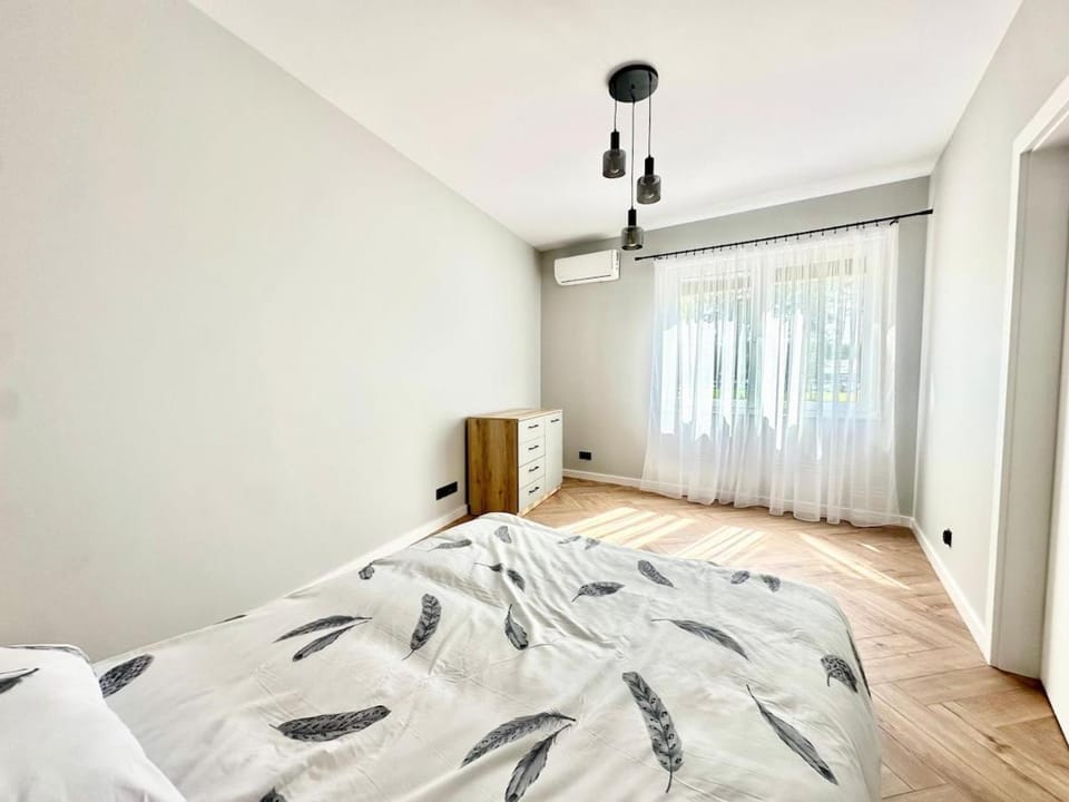 Salon z widokiem na jezioro Kisajno i 2 sypialnie Apartment in Poland