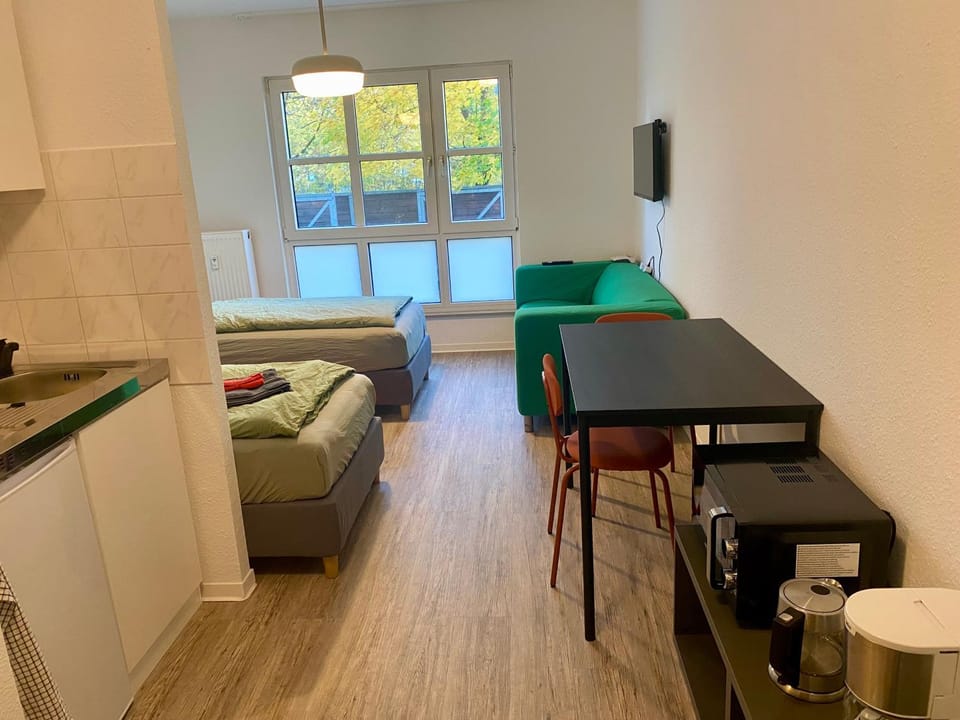 Kitchen or kitchenette, Living room, Photo of the whole room, Seating area, Dining area, Bedroom
