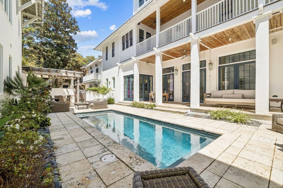 Property building, Patio, Seating area, Swimming pool