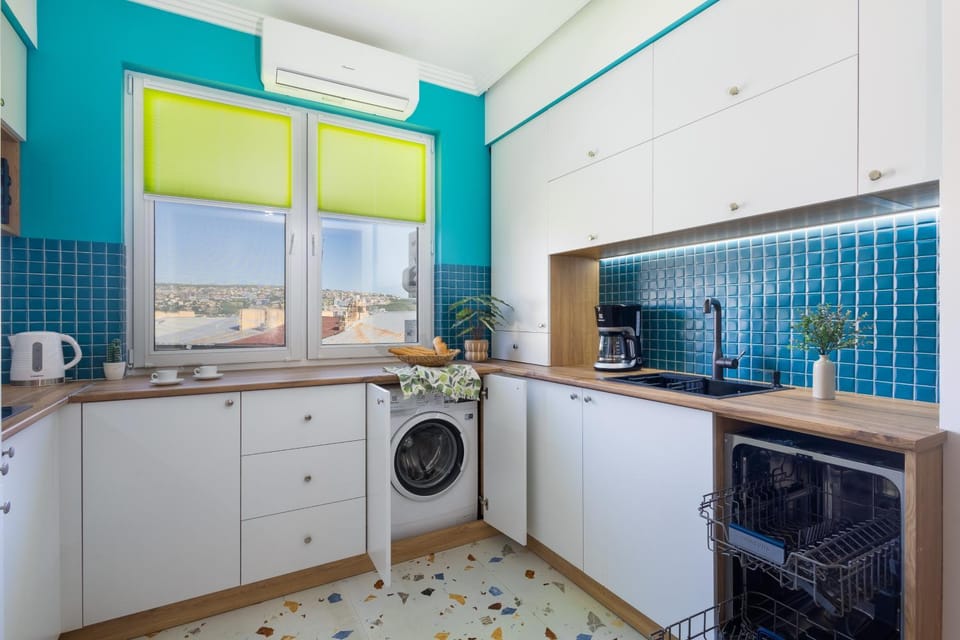 Kitchen or kitchenette, dishwasher, stove, washing machine