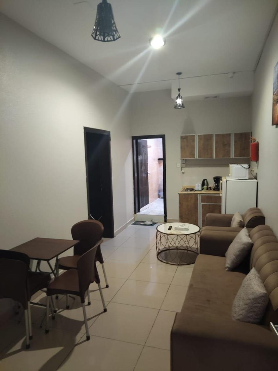 Kitchen or kitchenette, Living room, Seating area, stove