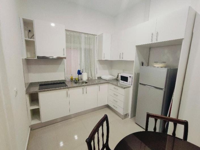 Kitchen or kitchenette, Dining area, microwave, stove, toaster