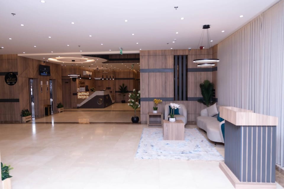 Lobby or reception, Lobby or reception, Seating area, group of guests, air conditioner