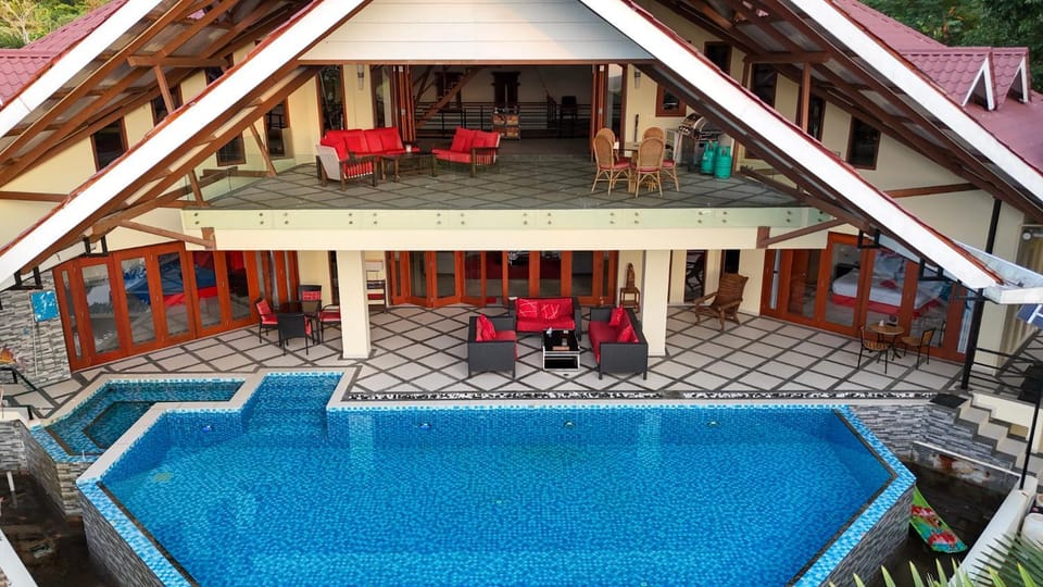 Property building, BBQ facilities, Seating area, Swimming pool