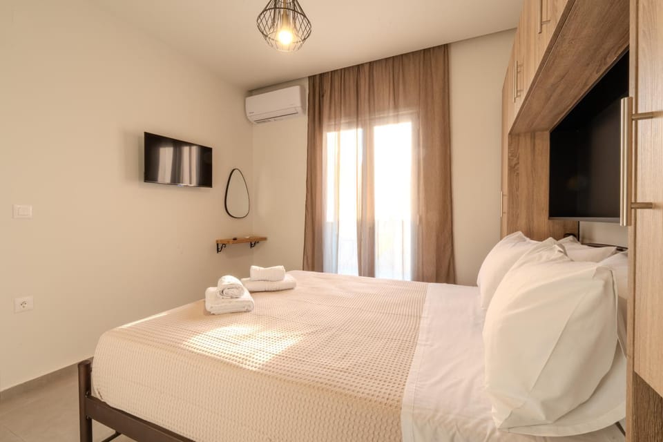 Bed, Photo of the whole room, Bedroom, towels, air conditioner