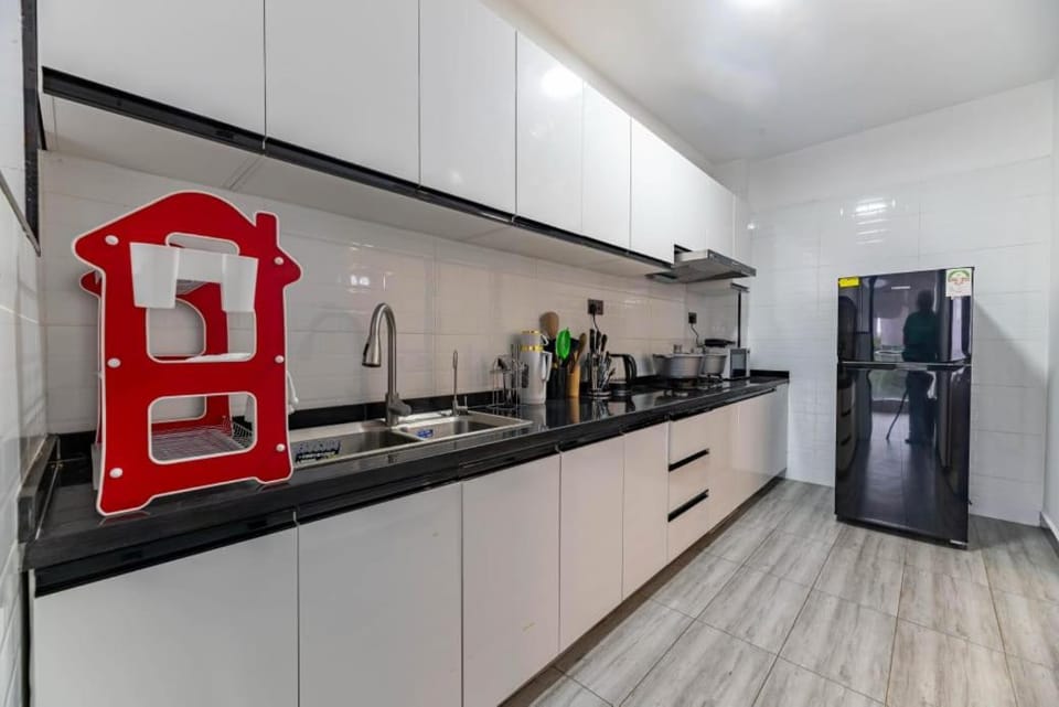 classy tastefully furnished executive three bedroom apartment with fully equipped gym ample parking space swimming pool children playing ground and amazing scenic views Apartment in Nairobi