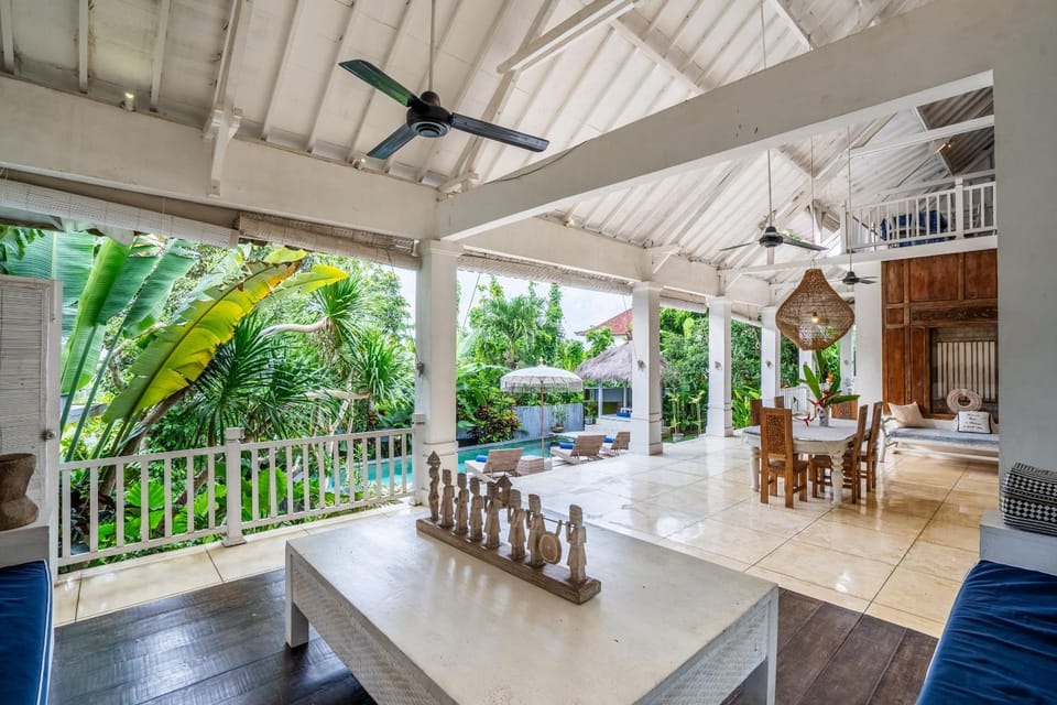 Living room, Seating area, Dining area, Garden view, Pool view