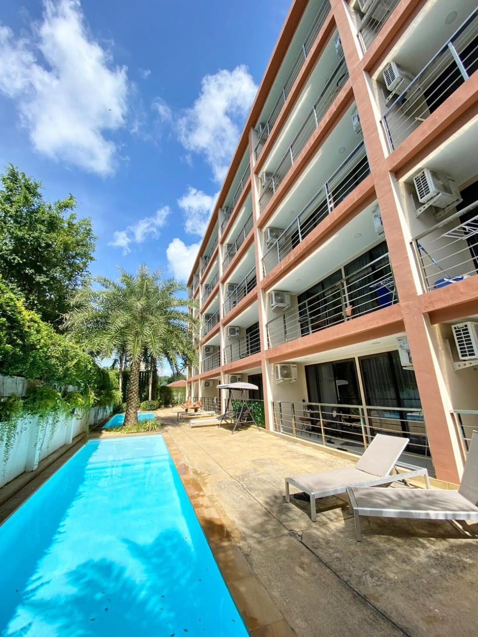 Property building, Pool view, Swimming pool, sunbed