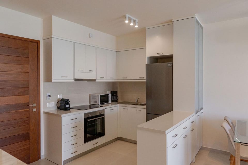 Kitchen or kitchenette, oven, stove, toaster