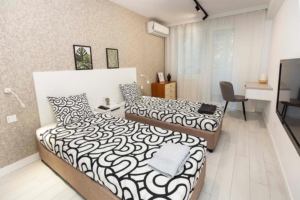 Photo of the whole room, Seating area, Bedroom, towels, air conditioner
