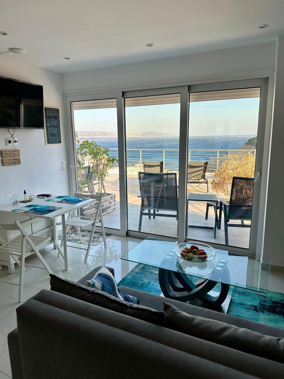 Natural landscape, View (from property/room), Living room, Seating area, Dining area, Sea view