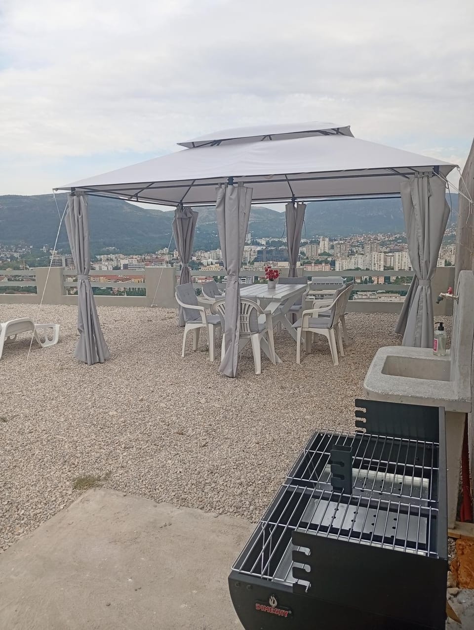 BBQ facilities, Seating area, City view, sunbed