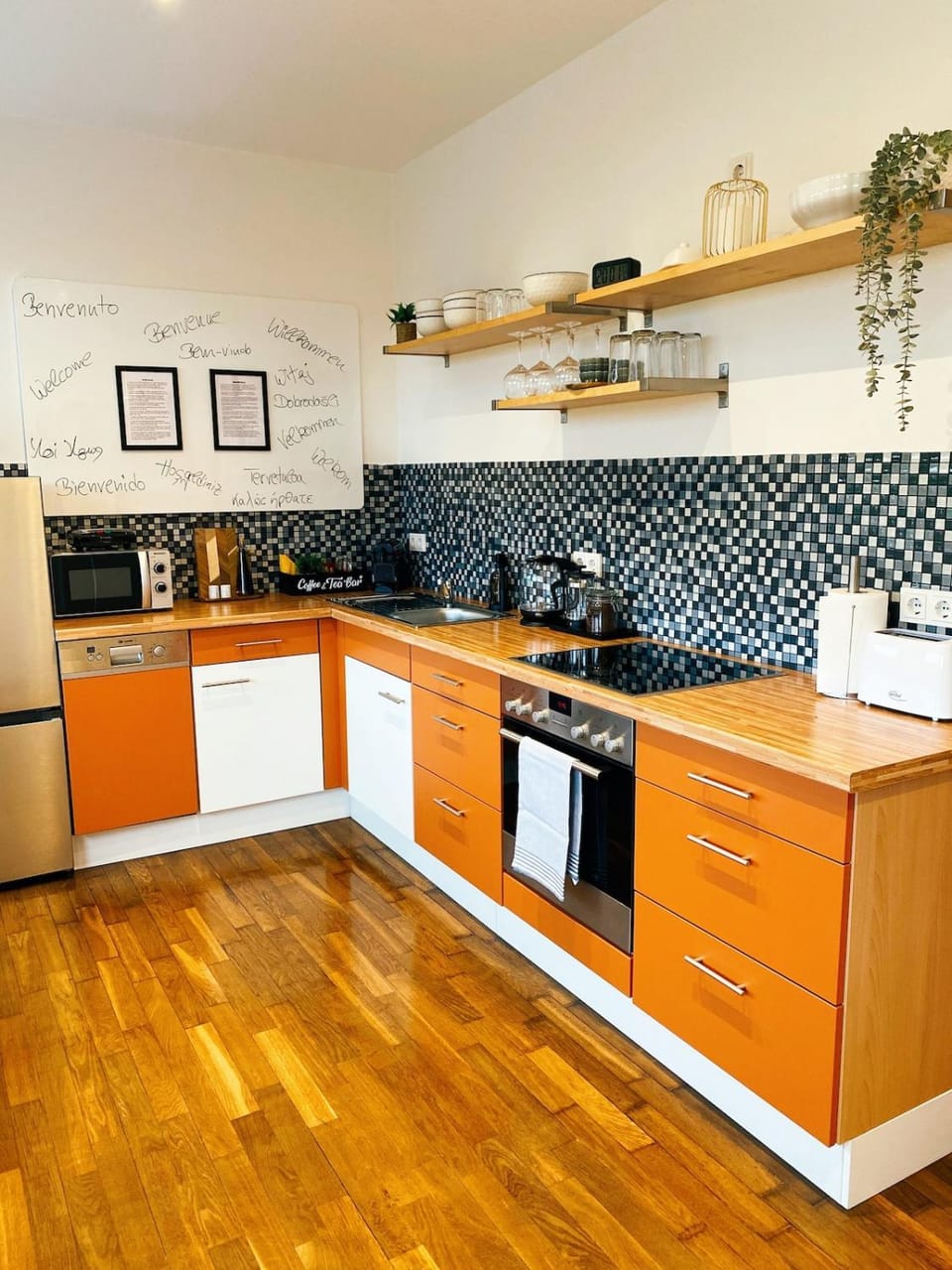 Kitchen or kitchenette, dishwasher, oven, stove, toaster