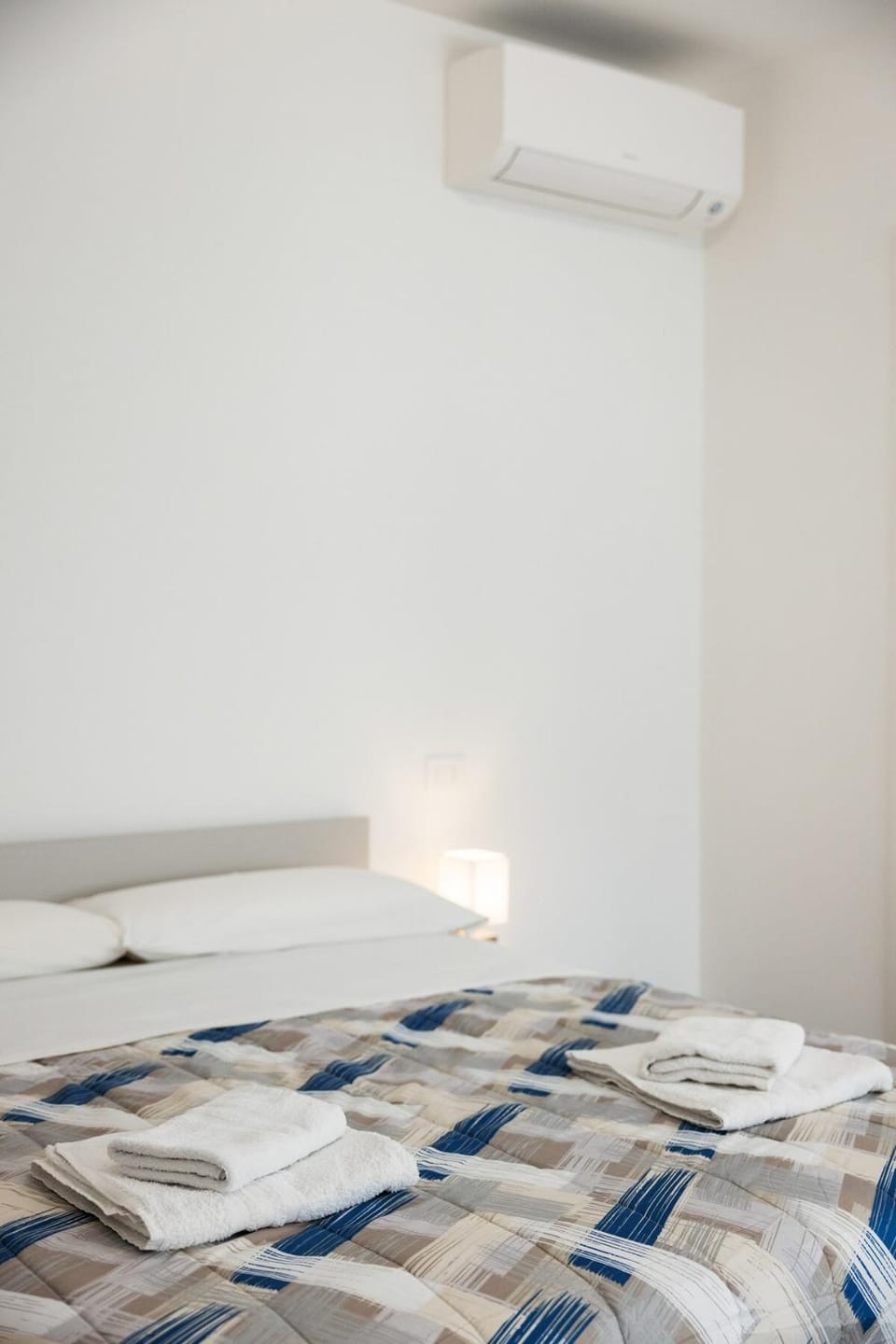 Bed, Photo of the whole room, Bedroom, towels, air conditioner