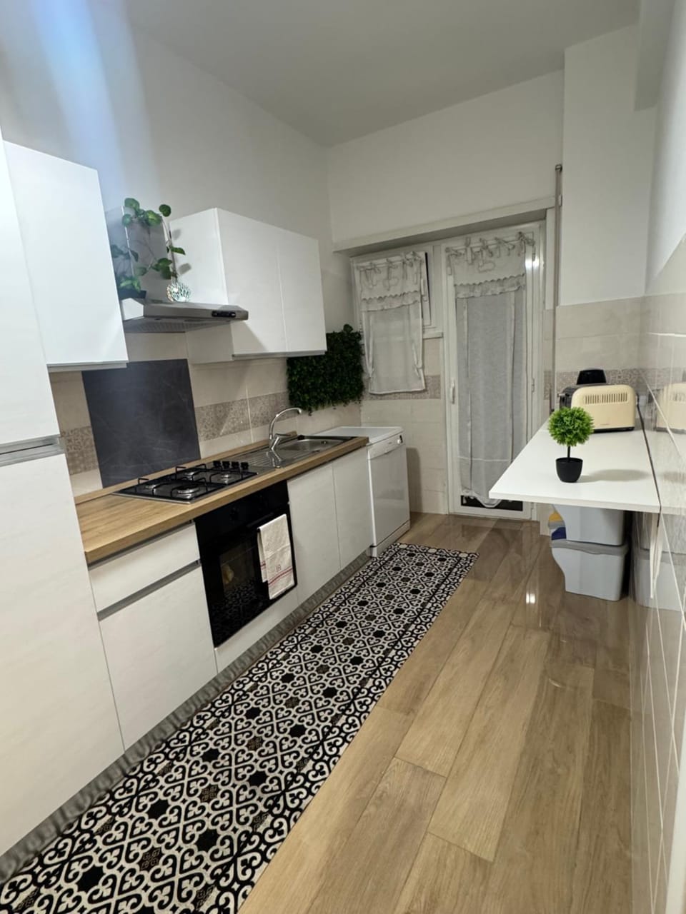 Kitchen or kitchenette, oven, stove