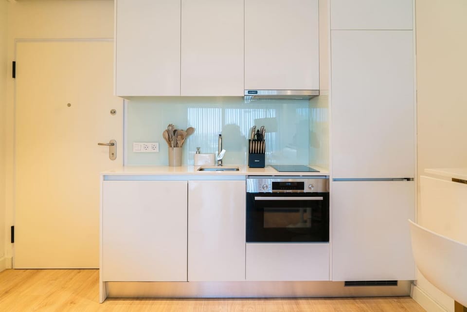 Kitchen or kitchenette, oven, stove