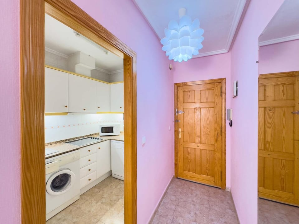 Kitchen or kitchenette, washing machine