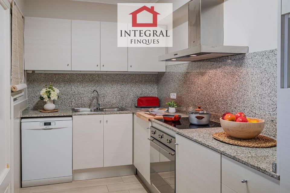 Kitchen or kitchenette, dishwasher, oven, stove