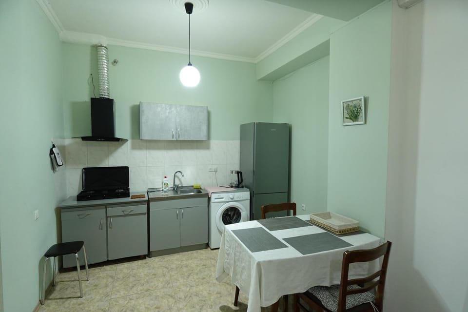 Dining area, oven, washing machine, kitchen