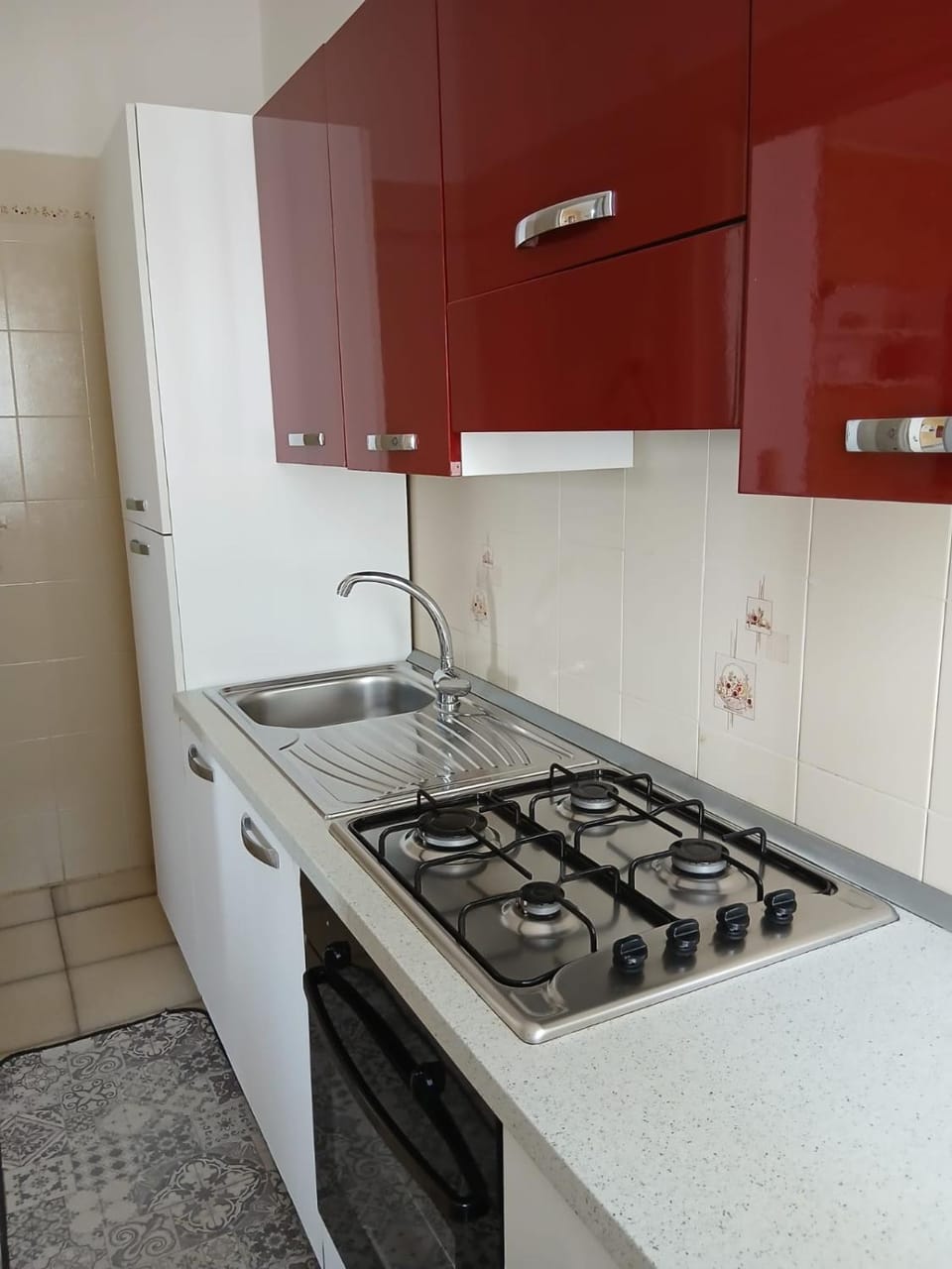 Kitchen or kitchenette, stove