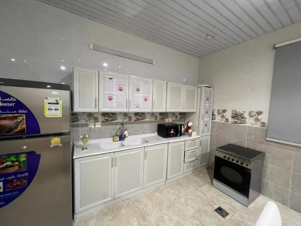 Kitchen or kitchenette, minibar, oven, washing machine, dryer