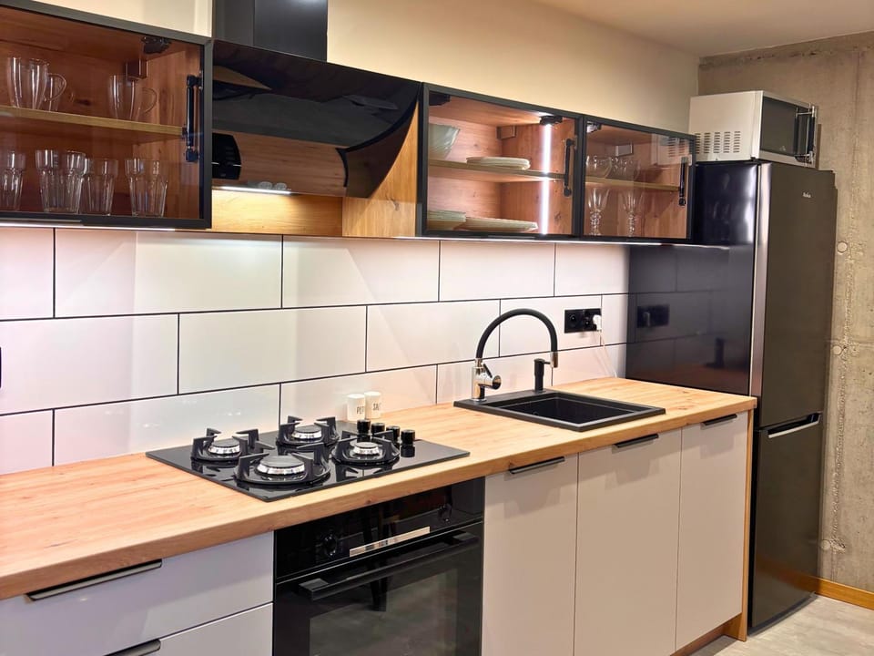 Kitchen or kitchenette, oven, stove