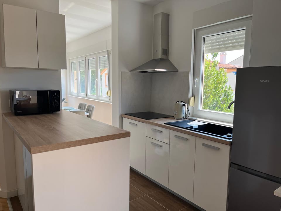 Kitchen or kitchenette, stove