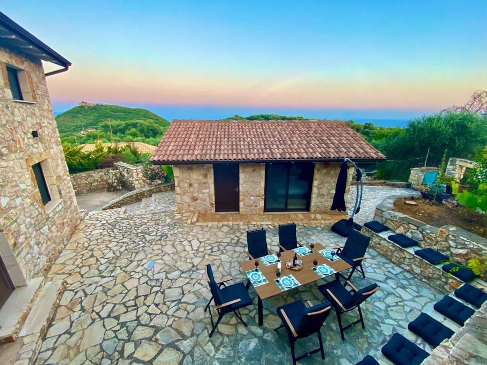 Property building, Patio, Natural landscape, Dining area, Sea view