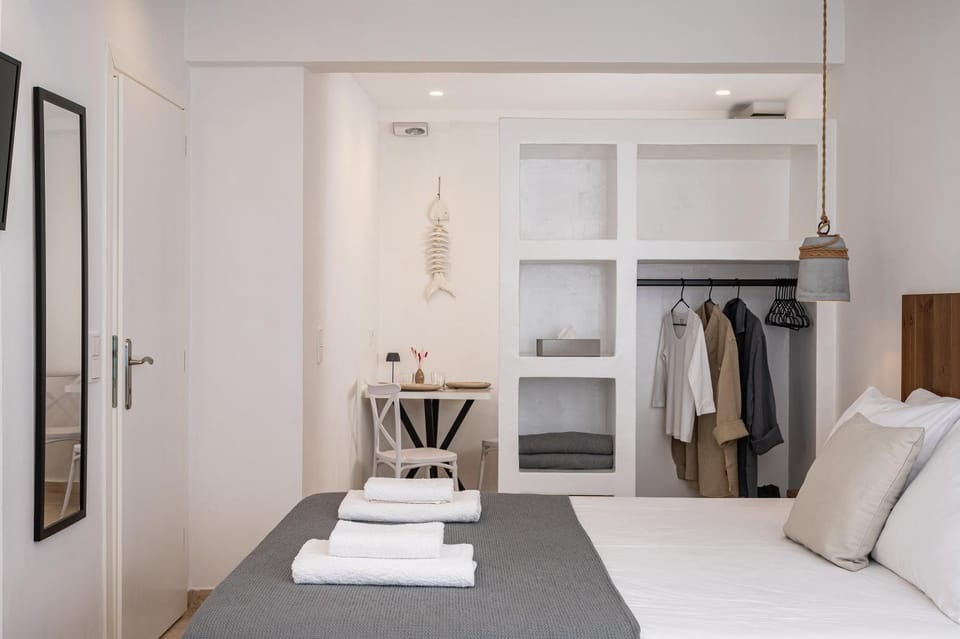 Bed, Photo of the whole room, flat iron, hair dryier, wardrobe