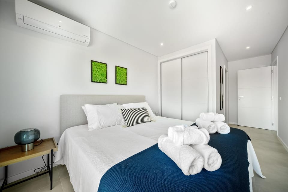 Bed, Photo of the whole room, Bedroom, towels, wardrobe, air conditioner