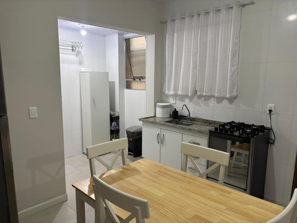Kitchen or kitchenette, stove, laundry