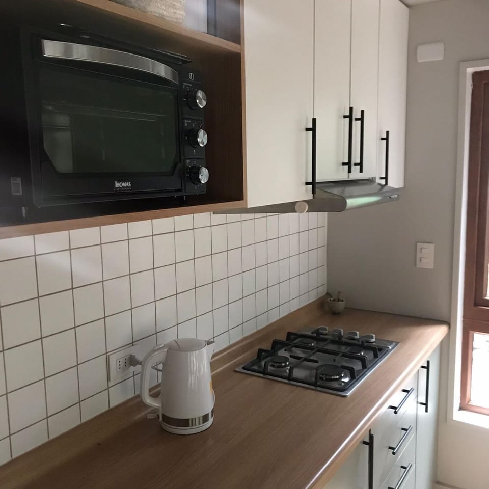 Kitchen or kitchenette, oven, stove